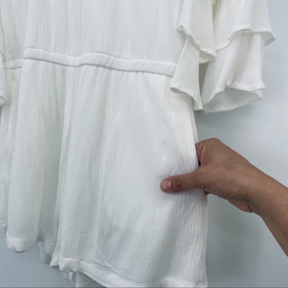 Lulu’s! White off shoulder all in one shorts romper! Flutter sleeves. - Picture 5 of 10